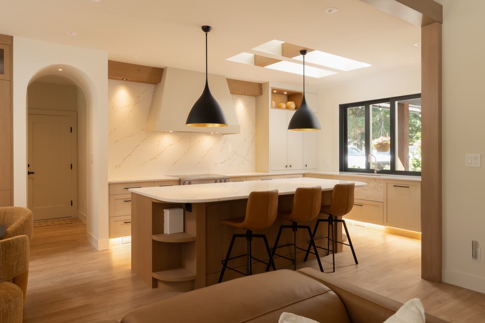 Full-height millwork with integrated storage.
